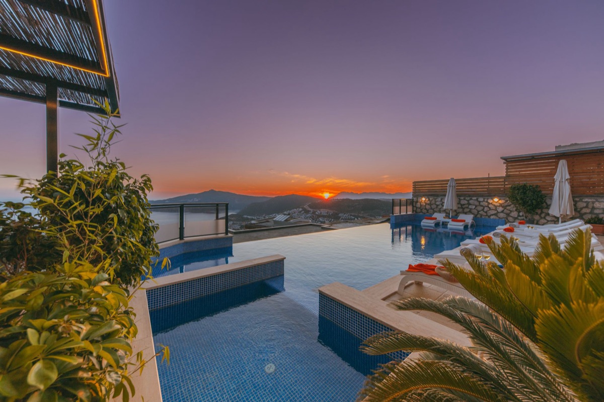 Resort infinity pool at sunset