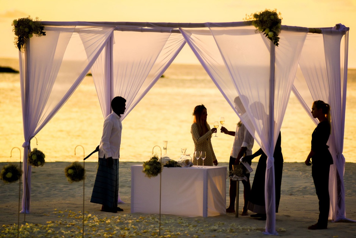 Guests relaxing on resort beach