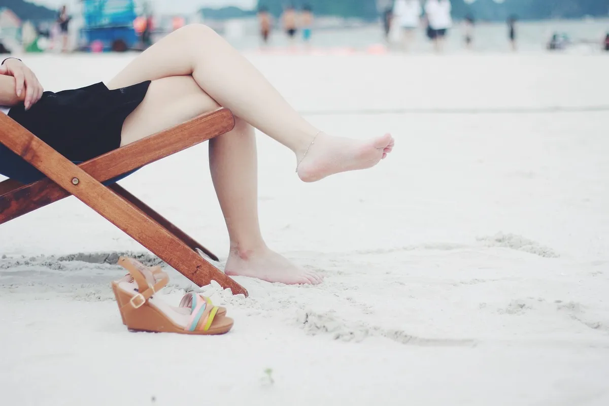 woman, beach, beach chair, feet, female, barefoot, girl, lady, legs, leisure, outdoors, recreation, relaxation, resort, resting, sand, sandals, sitting, wooden